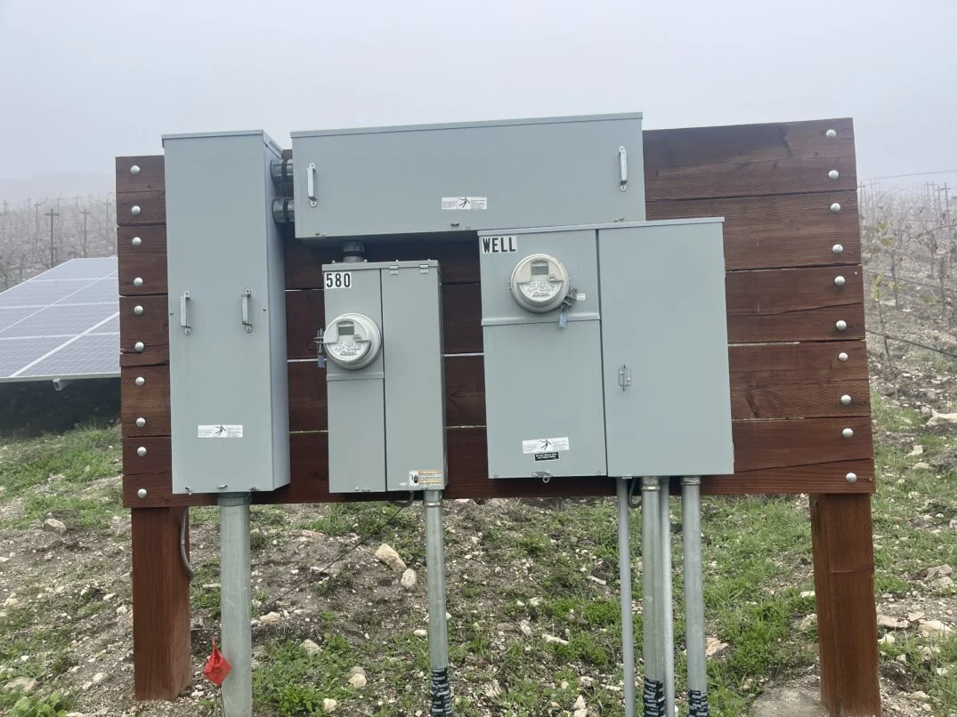 Electrical panels and meters in a vineyard
